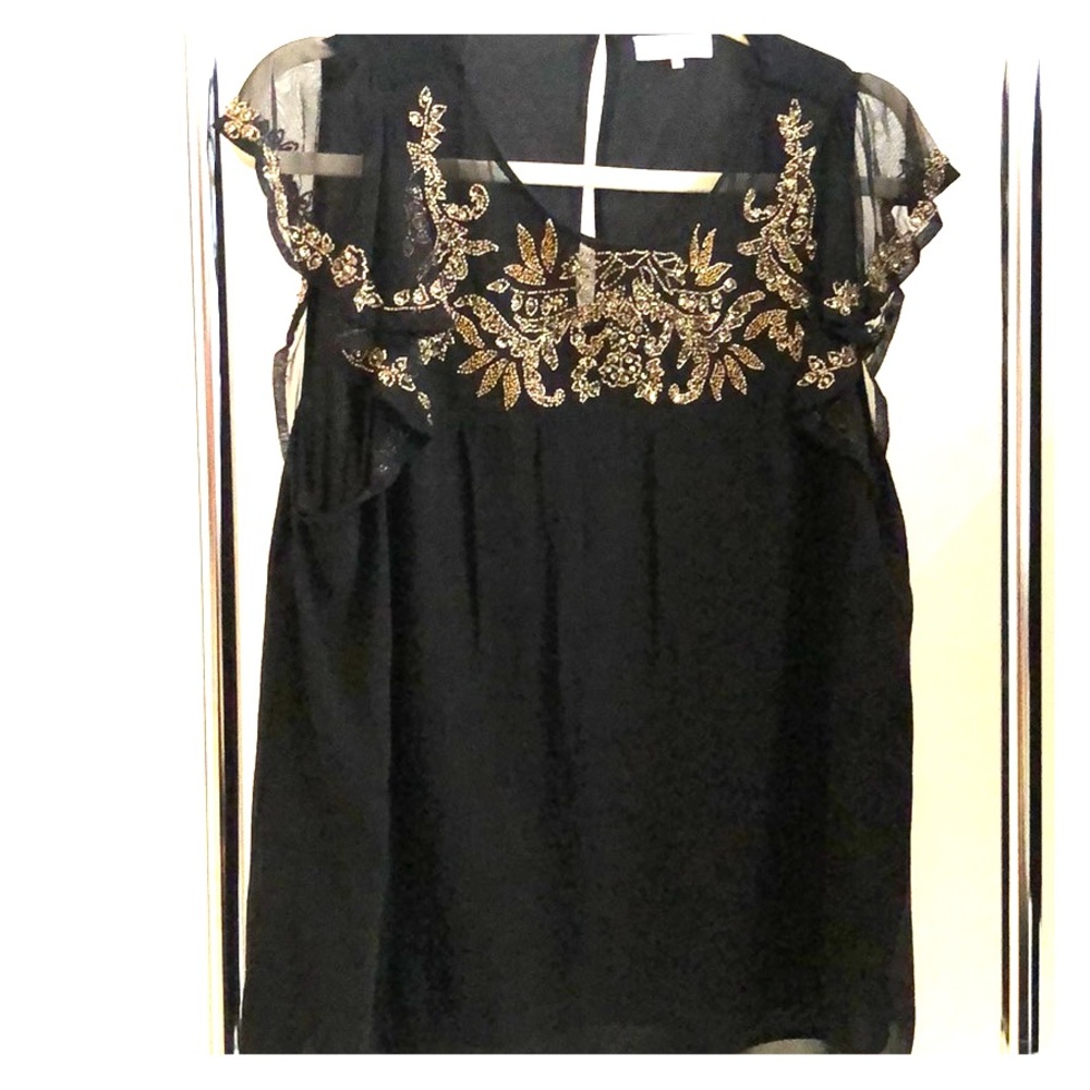 Parker blouse with detailed gold beading.